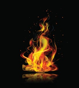 Realistic fire on a black background with reflection